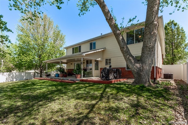 105 Hawthorn St, Frederick, CO 80530 - rear view of house featuring a patio area and central AC unit