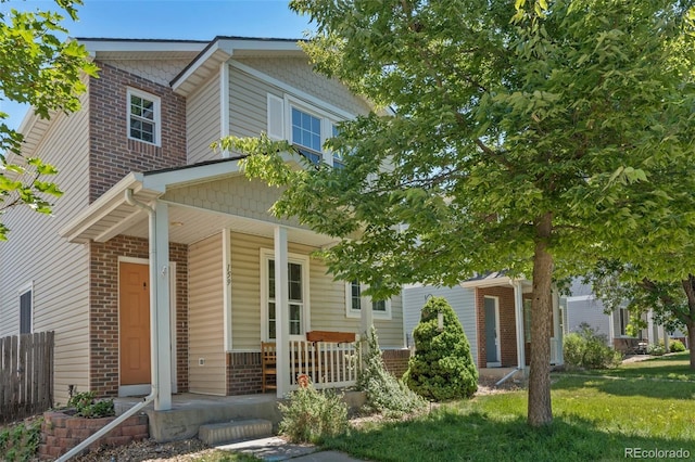 view of front of property featuring covered porch