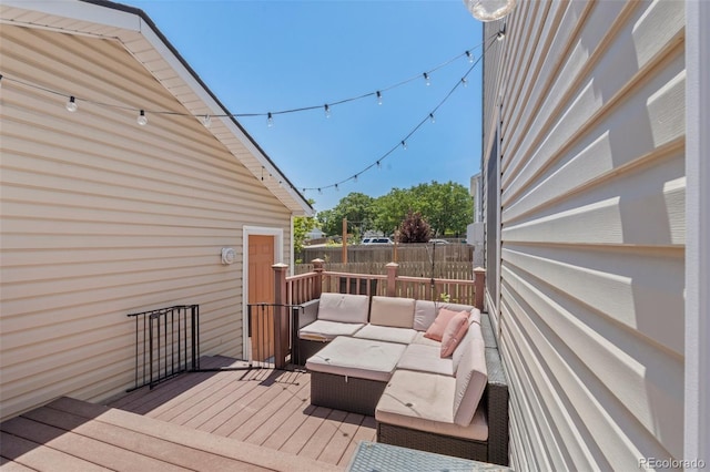 wooden deck featuring an outdoor hangout area