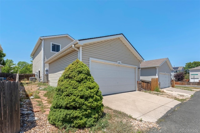 view of side of home with a garage