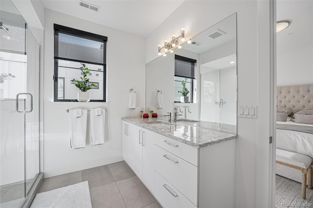 bathroom with a shower stall, visible vents, connected bathroom, and tile patterned floors