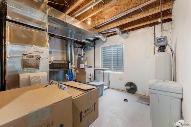 basement featuring water heater