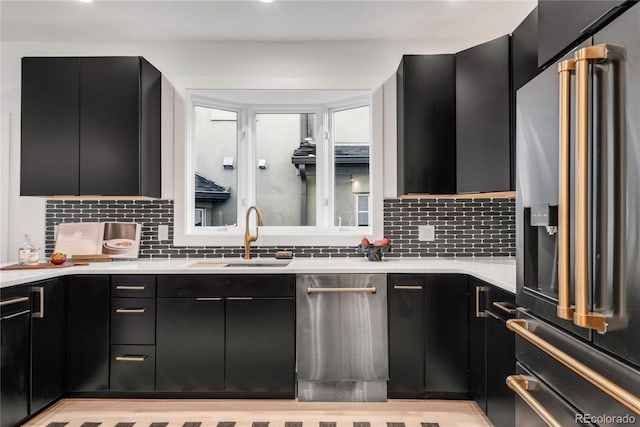 kitchen with tasteful backsplash, sink, and stainless steel appliances