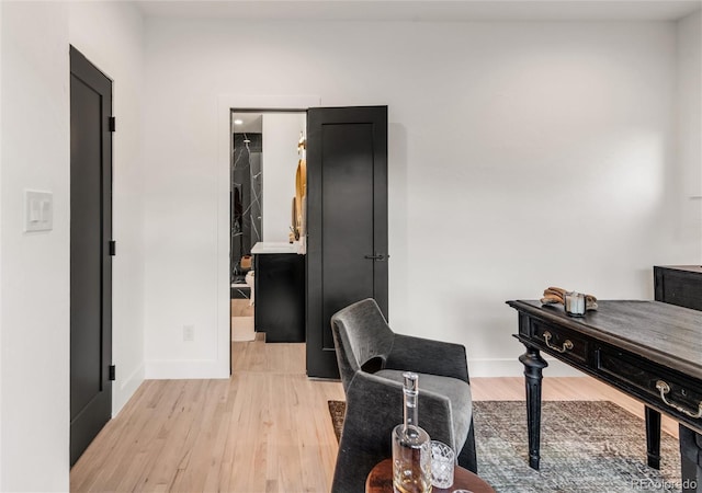 office area with light wood-type flooring