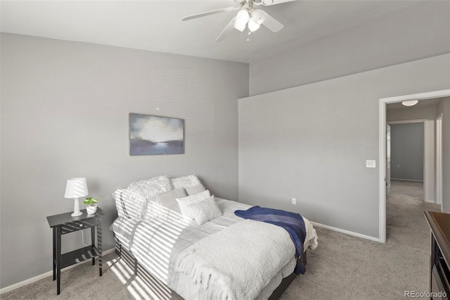 bedroom featuring ceiling fan and light colored carpet