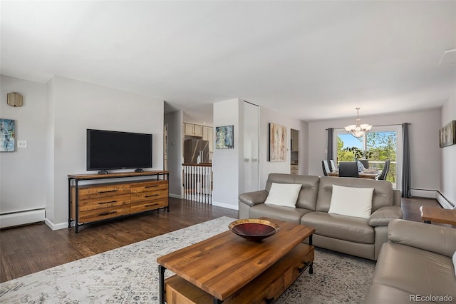 6150 S Southwood Dr, Centennial, CO 80121 - living room with a chandelier, dark wood-style flooring, baseboards, a baseboard radiator, and baseboard heating