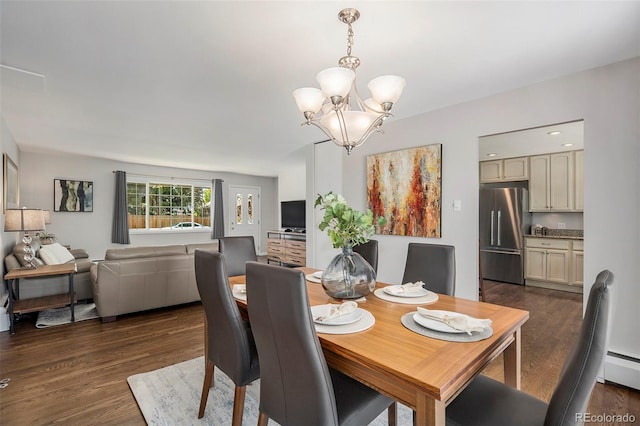 6150 S Southwood Dr, Centennial, CO 80121 - dining room featuring a chandelier, dark wood-type flooring, and a baseboard radiator