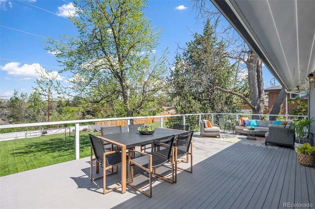 6150 S Southwood Dr, Centennial, CO 80121 - deck with an outdoor hangout area, a yard, and outdoor dining space