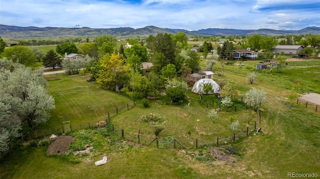 bird's eye view with a mountain view and a rural view