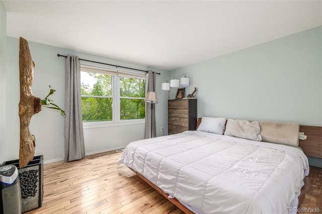 bedroom featuring light hardwood / wood-style flooring