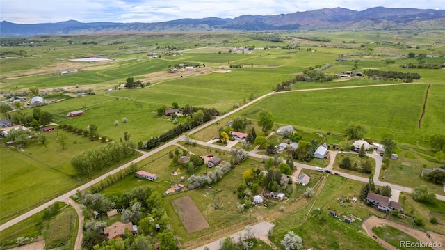 aerial view featuring a mountain view and a rural view