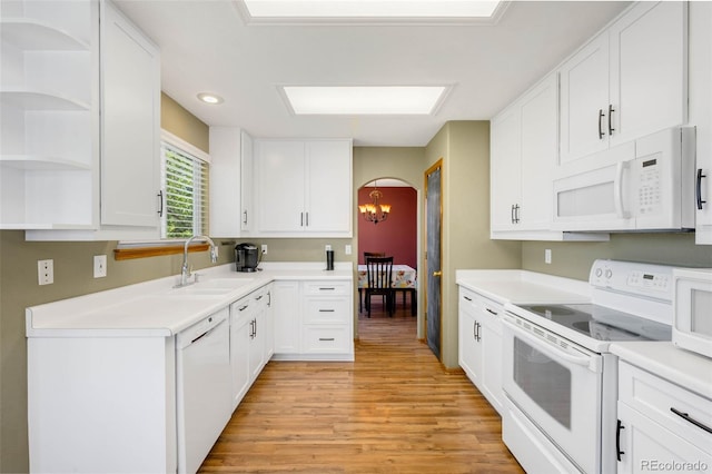 19817 E Prentice Ave, Centennial, CO 80015 - kitchen with white appliances, a sink, light wood-style flooring, white cabinets, and open shelves