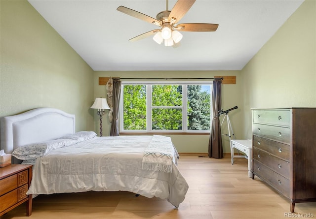 19817 E Prentice Ave, Centennial, CO 80015 - bedroom with vaulted ceiling, light wood-style floors, a ceiling fan, and baseboards