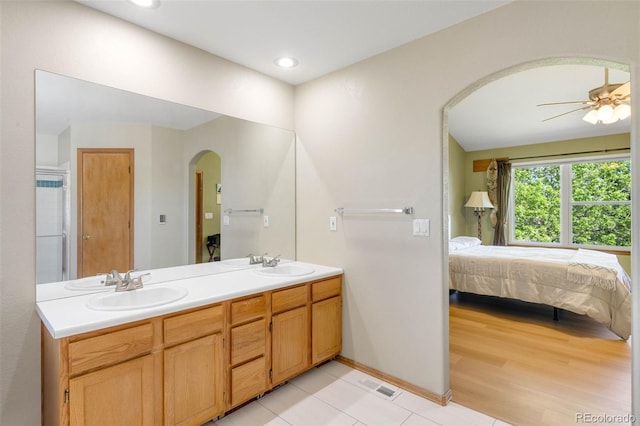 19817 E Prentice Ave, Centennial, CO 80015 - ensuite bathroom with double vanity, recessed lighting, ceiling fan, and tile patterned floors