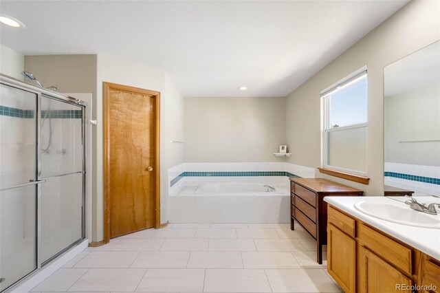 19817 E Prentice Ave, Centennial, CO 80015 - full bath with a shower stall, a garden tub, vanity, and recessed lighting