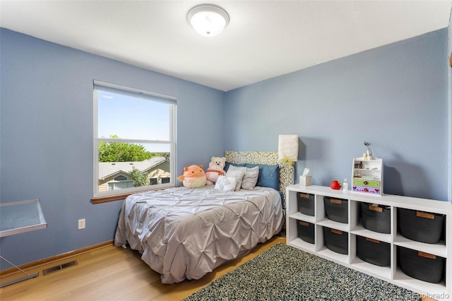 19817 E Prentice Ave, Centennial, CO 80015 - bedroom with wood finished floors and baseboards