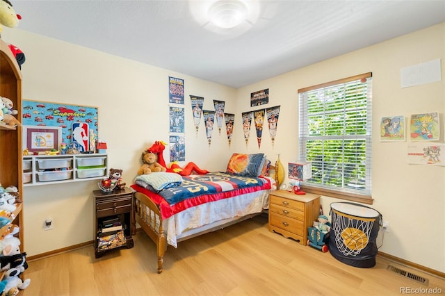 19817 E Prentice Ave, Centennial, CO 80015 - bedroom featuring wood finished floors and baseboards