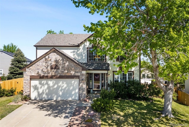 19817 E Prentice Ave, Centennial, CO 80015 - view of front facade featuring a garage, driveway, and stone siding