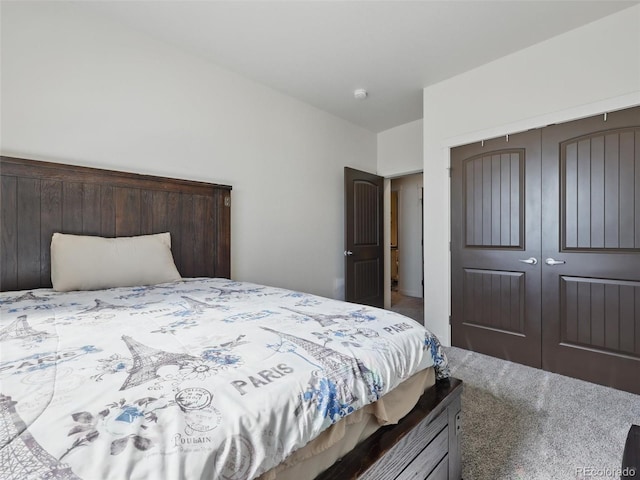 carpeted bedroom featuring a closet