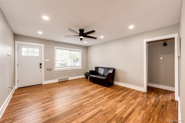 1945 Yosemite St, Denver, CO 80220 - unfurnished room featuring light wood-style floors, a ceiling fan, recessed lighting, and baseboards
