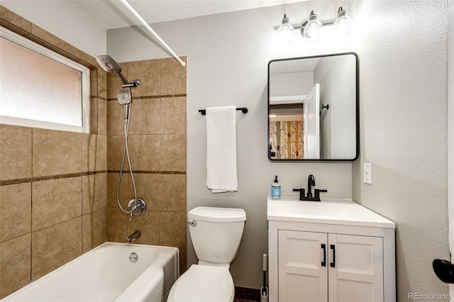 1945 Yosemite St, Denver, CO 80220 - bathroom featuring toilet, vanity, and shower / washtub combination