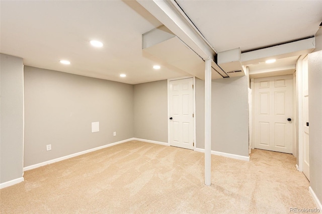 1945 Yosemite St, Denver, CO 80220 - finished basement with light carpet, recessed lighting, and baseboards
