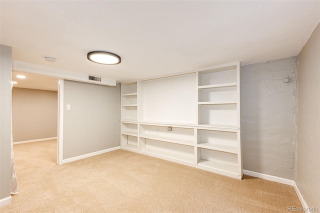 1945 Yosemite St, Denver, CO 80220 - carpeted empty room featuring baseboards and a smoke detector