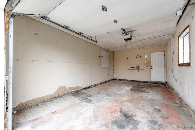1945 Yosemite St, Denver, CO 80220 - garage featuring a garage door opener