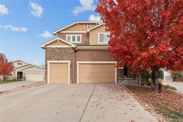 15003 W 63rd Ave, Arvada, CO 80403 - view of front facade featuring stone siding, a garage, concrete driveway, and board and batten siding