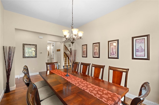 15003 W 63rd Ave, Arvada, CO 80403 - dining room with a chandelier, dark wood finished floors, and stairs