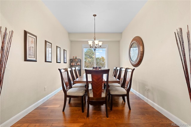 15003 W 63rd Ave, Arvada, CO 80403 - dining space with a chandelier and wood finished floors