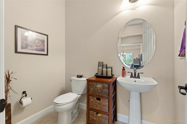 15003 W 63rd Ave, Arvada, CO 80403 - half bathroom featuring toilet and tile patterned flooring
