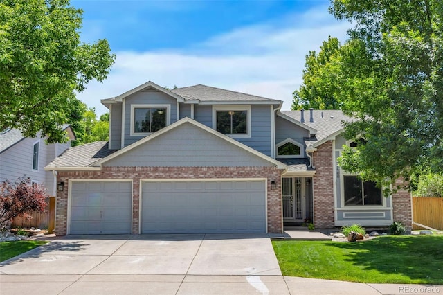 7900 E Iowa Ave, Denver, CO 80231 - view of front facade featuring an attached garage, concrete driveway, brick siding, and a shingled roof