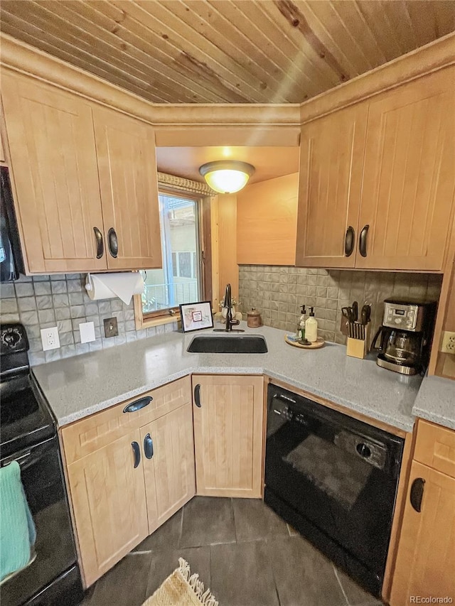 kitchen with backsplash, light brown cabinetry, black appliances, dark tile patterned flooring, and sink