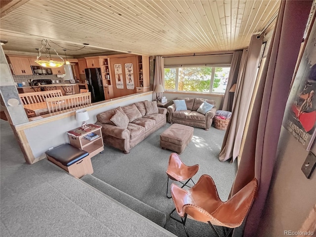 carpeted living room featuring wooden ceiling