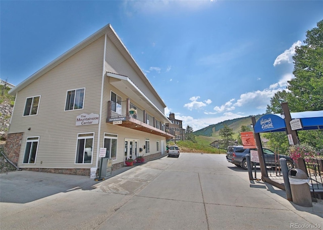 exterior space featuring a mountain view