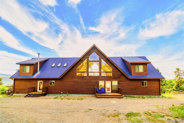 70 Sheep Creek Trl, Fairplay, CO 80440 - back of house with a metal roof and a deck