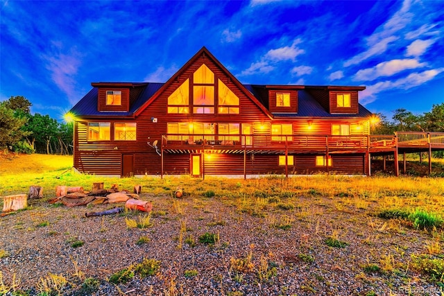 70 Sheep Creek Trl, Fairplay, CO 80440 - rear view of property with a wooden deck and log veneer siding