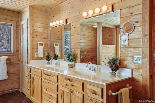 70 Sheep Creek Trl, Fairplay, CO 80440 - bathroom featuring wood walls, wood ceiling, double vanity, and wood finished floors