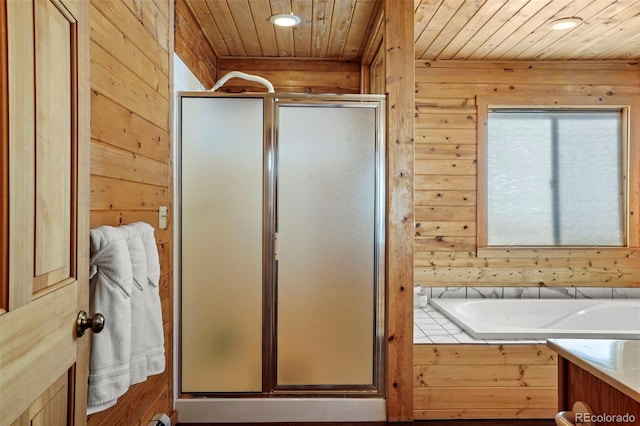 70 Sheep Creek Trl, Fairplay, CO 80440 - bathroom with wooden walls, wooden ceiling, a stall shower, a garden tub, and recessed lighting