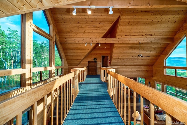 70 Sheep Creek Trl, Fairplay, CO 80440 - stairway with rail lighting, wood ceiling, lofted ceiling, wooden walls, and a ceiling fan