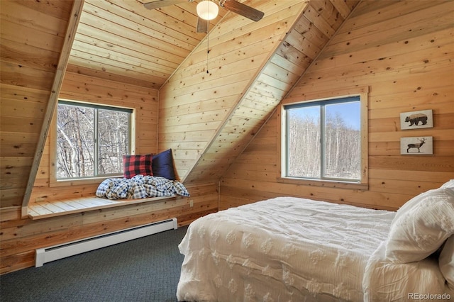 70 Sheep Creek Trl, Fairplay, CO 80440 - bedroom featuring a baseboard radiator, wooden walls, multiple windows, carpet, and wooden ceiling