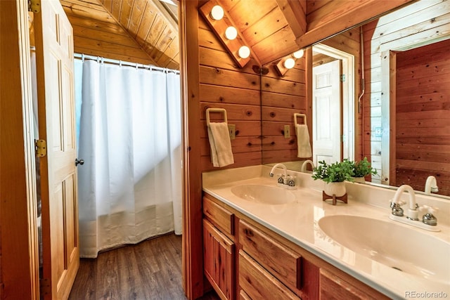 70 Sheep Creek Trl, Fairplay, CO 80440 - full bath with wooden walls, double vanity, wood finished floors, vaulted ceiling, and wood ceiling