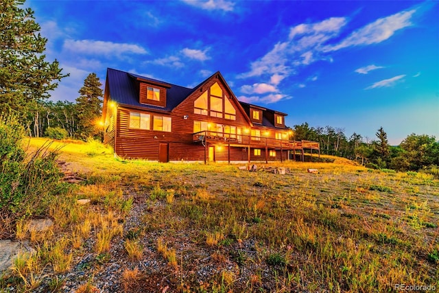 70 Sheep Creek Trl, Fairplay, CO 80440 - back of house featuring faux log siding and a deck