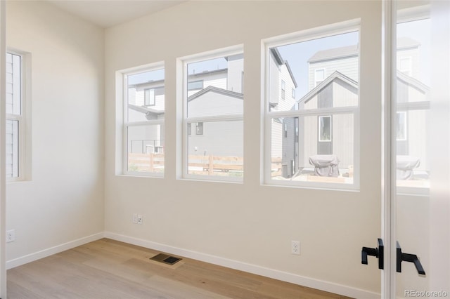 11324 Alla Breve Cir, Lone Tree, CO 80134 - spare room with wood finished floors and baseboards