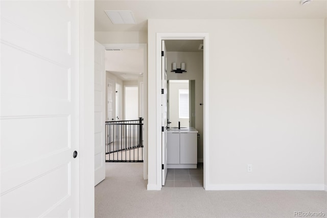 11324 Alla Breve Cir, Lone Tree, CO 80134 - corridor with light carpet and an upstairs landing
