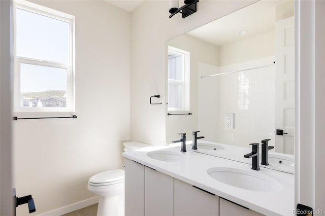 11324 Alla Breve Cir, Lone Tree, CO 80134 - bathroom with double vanity, a shower, and tile patterned floors