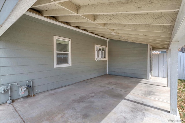 6660 Locust St, Commerce City, CO 80022 - view of patio / terrace featuring cooling unit, an attached carport, and fence