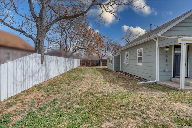 6660 Locust St, Commerce City, CO 80022 - view of yard featuring a fenced backyard