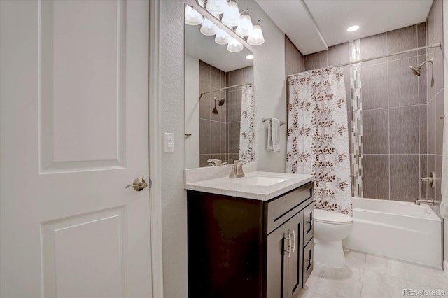 full bathroom with tile patterned floors, vanity, toilet, and shower / bath combo